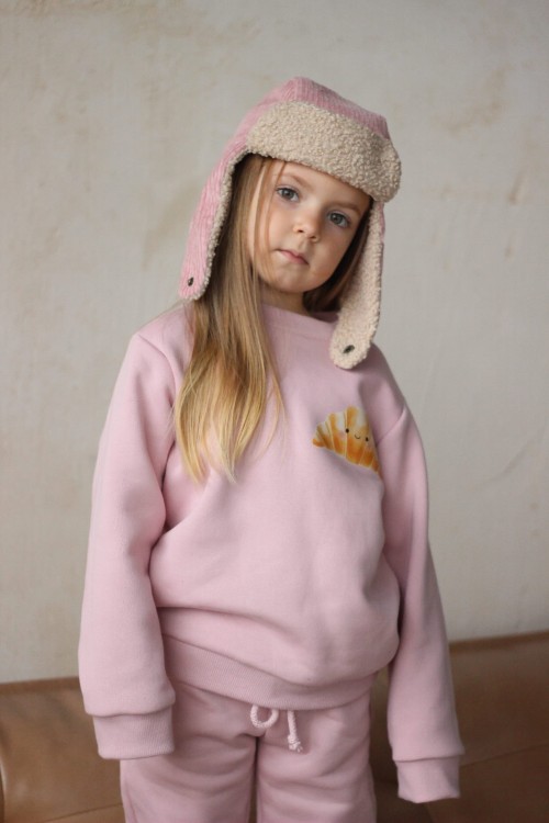 Pudrowa bluza dziecięca bez kaptura z naszytym croissantem